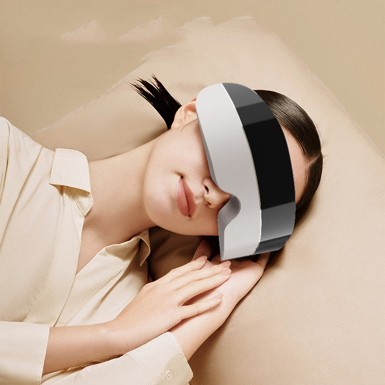 Nano Steam Eye Massager in use showing mist function